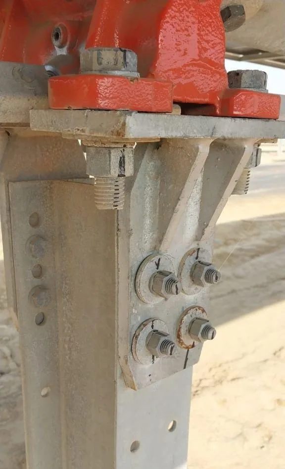 A slew drive seat bolted under a solar tracker drive